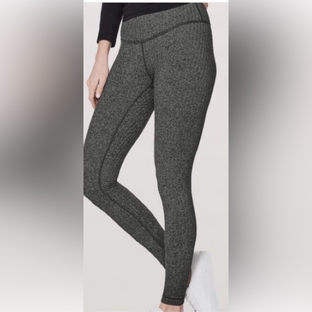 Lululemon houndstooth black piping low rise legging, size 6, 28 inches long